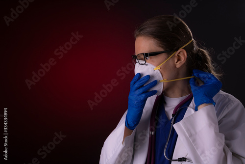 COVID-19 healthcare worker using PPE protective equipment