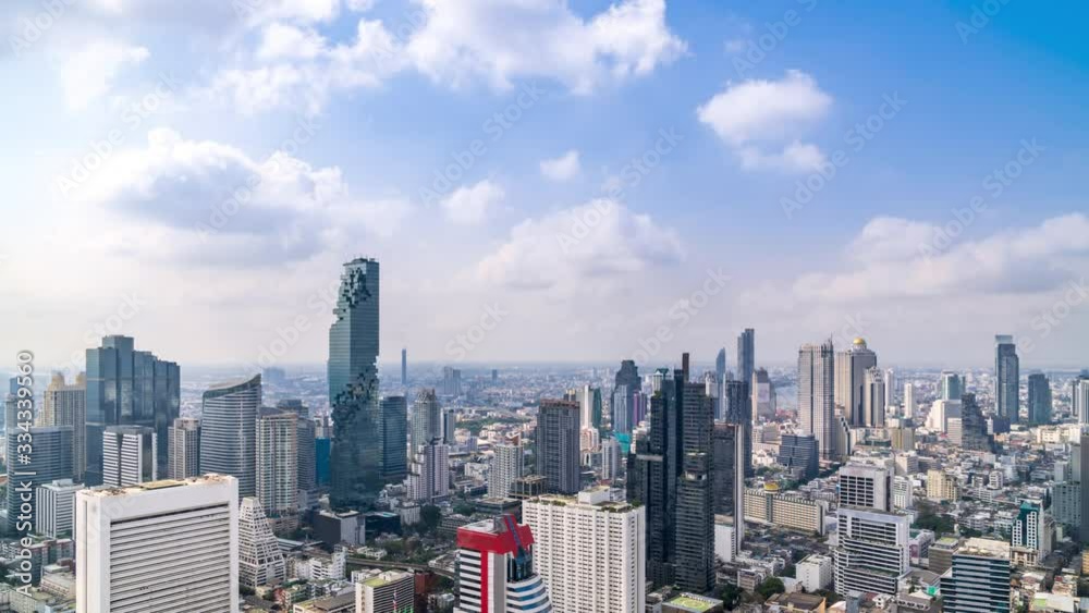 Bangkok business district city center above Silom area, with cloud pass over buildings and skyscrapers – Time Lapse