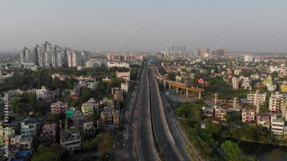 Kolkata metro skyscrappers patuli biswabangla highland park bypass cityscape drone footage aerial view. Indian high way roads and landmarks of subcontinent forward push. Kolkata metro skyscrappers patuli biswabangla highland park bypass cityscape drone footage aerial view. Indian high way roads and landmarks of subcontinent forward push.