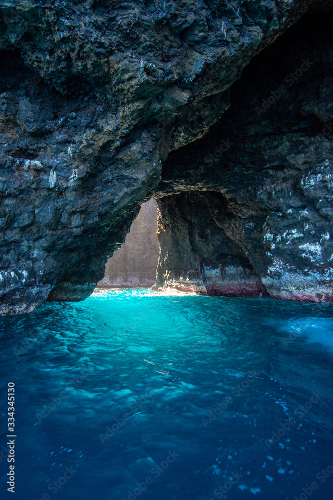 hidden cove island in the sea with blue waters
