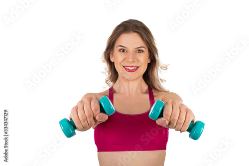 Active woman holding dumbbells on isolated © Ocskay Mark