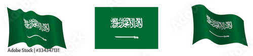 Flag of the Kingdom of Saudi Arabia in a static position and in motion, developing in the wind, on a white background