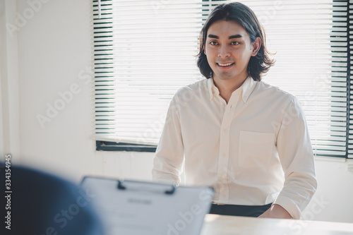 job interview concept. Businessman asking candidate applicant in interview room.