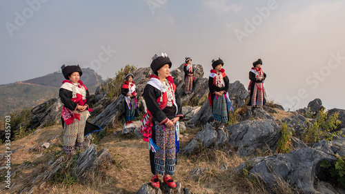 Yao or Mien hill tribe on Landscapes Sunrise twilight sky over high 103 mountains viewpoint at Banphatang Village ,Wiang Kaen District, Chiang Rai Province , Northwest Thailand.. photo