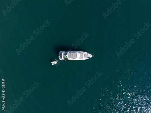 boat in  blue water photo