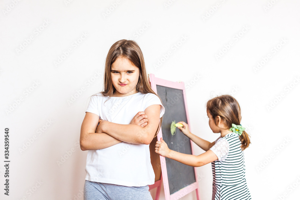 older sister took offense at the younger, was not allowed to draw on a blackboard and chalk, quarrels at home, a long quarantine because coronavirus, without kindergarten school, distance learning older sister took offense at the younger, was not allowed to draw on a blackboard and chalk, quarrels at home, a long quarantine because coronavirus, without kindergarten school, distance learning