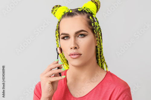 Portrait of young transgend...