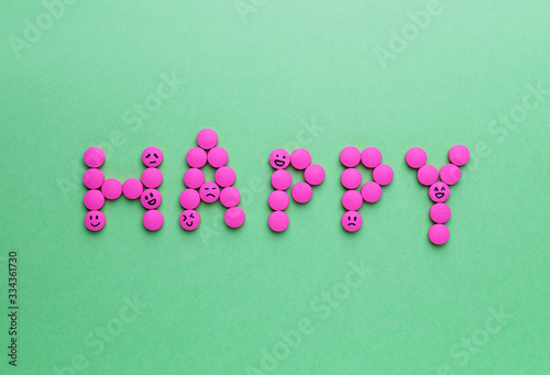 Word "Happy" made of pills ...