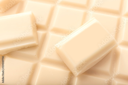 Sweet white chocolate as background, closeup