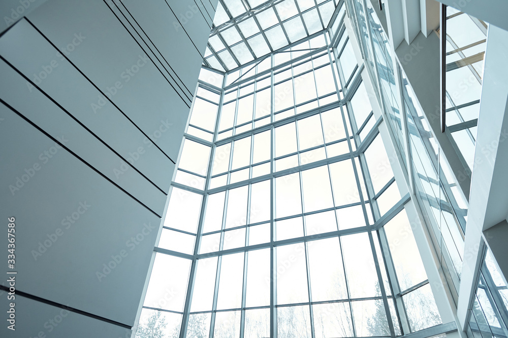 Obraz premium Interior of large contemporary multi-floor office building or business center