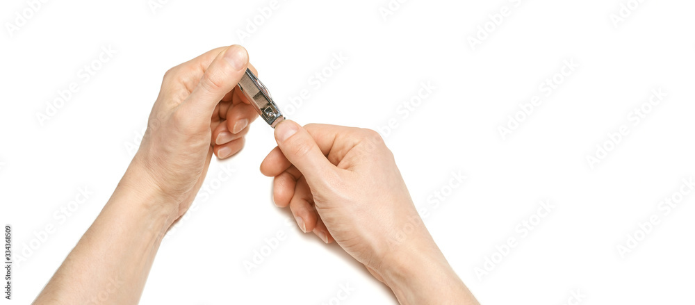 Man do manicure at home. Self hand routine. Copy space for text. Male finger procedure. White background isolated. Copyspace. Thumb fingernail clean. Man manicurist service. Horizontal Man do manicure at home. Self hand routine. Copy space for text. Male finger procedure. White background isolated. Copyspace. Thumb fingernail clean. Man manicurist service. Horizontal
