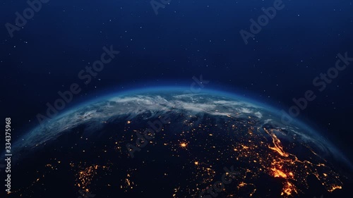 The Night seen of Planet Earth City Lights from the International Space Station space clouds . Sunsire 4K Loop Animation. Space, Planet, Galaxy, Stars, Cosmos, Sea, Earth, Sunset, Globe, World. photo