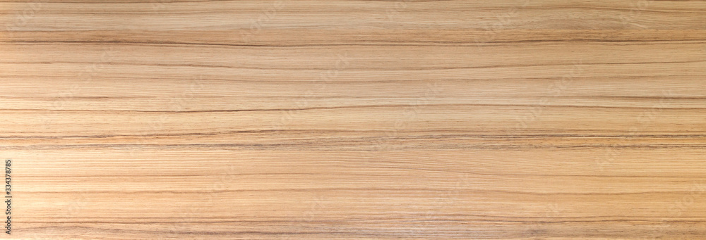Fototapeta premium Tekstura drewna. Struktura drewna do projektowania i dekoracji. Kolor jest pomarańczowo-beżowy z cienkim brązowym paskiem. Drobna tekstura, wzór. Naturalne tło drewna.
