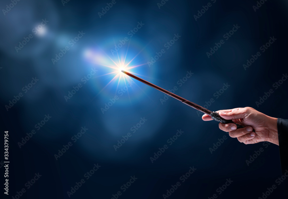 Magic wand with sparkle on miracle background, Miracle magical stick Wizard tool on hot background. - obrazy, fototapety, plakaty 