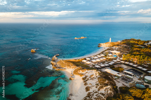 Aerial drone shot of Rottnest Island at sunrise. The Basin and Pinky beach can be seen below. 