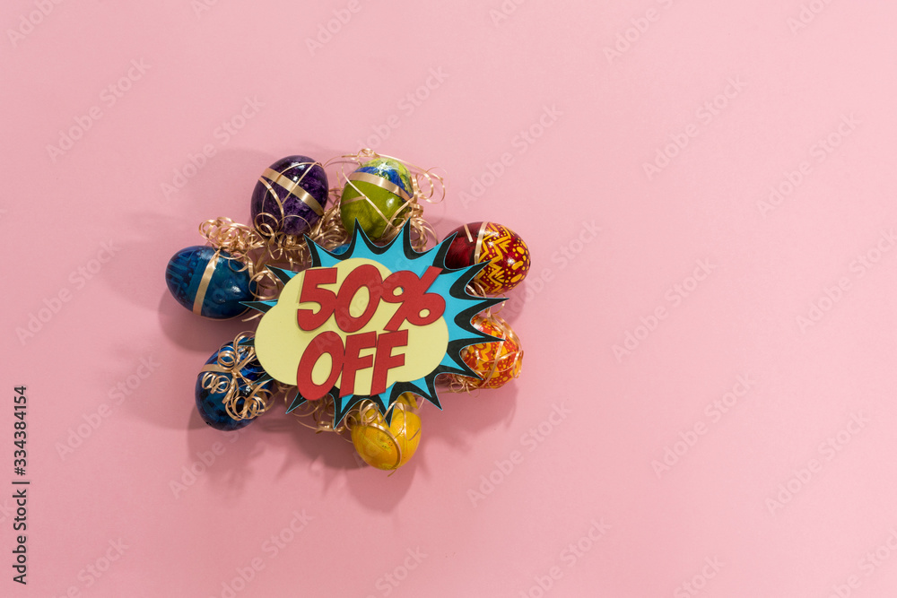 Top view of easter eggs. 50% off pop style.