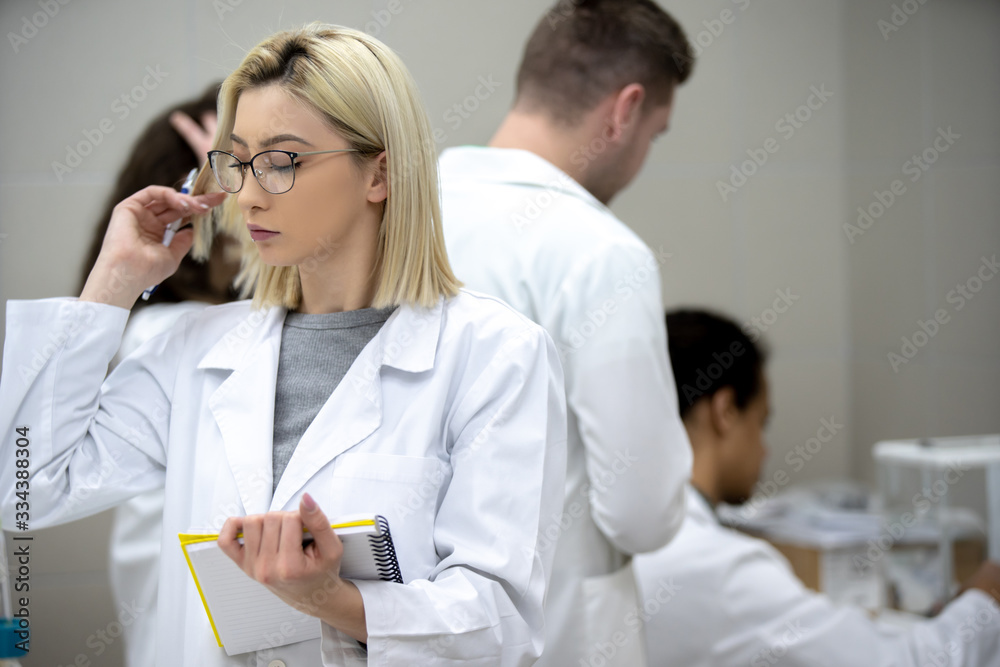 Laboratory scientist working at lab with test tube Laboratory scientist working at lab with test tube
