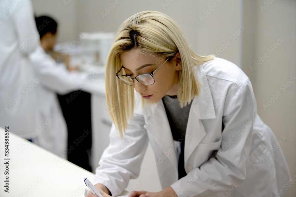 Laboratory scientist working at lab with test tube Laboratory scientist working at lab with test tube