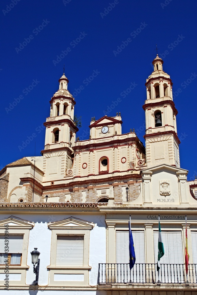 View of the town hall with the church to the rear (Parish of Our Lady of the Incarnation), Olvera, Spain.