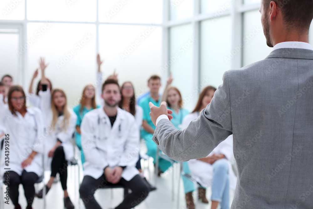 top view. a group of smiling doctors pointing at you. top view. a group of smiling doctors pointing at you.