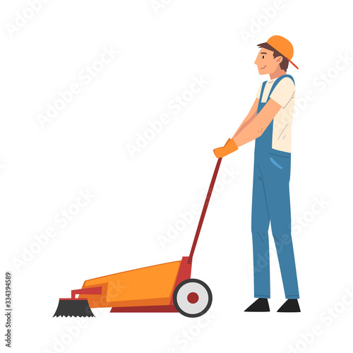Professional Cleaning Man Using Floor Cleaning Machine, Male Worker Character Dressed in Blue Overalls and Rubber Gloves, Cleaning Company Staff Vector Illustration