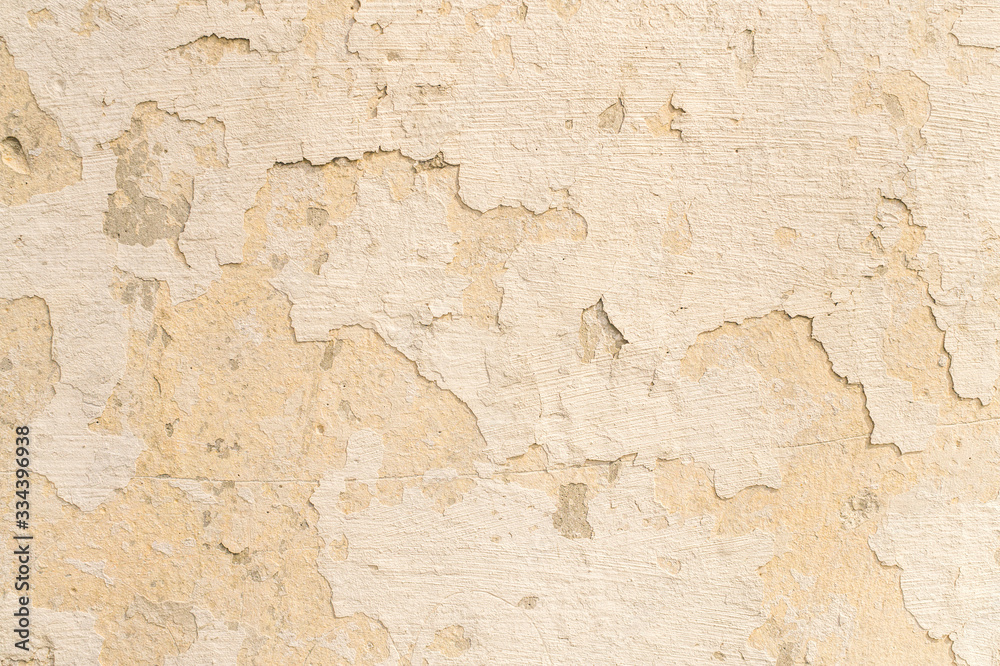  Old cracked and peeled  wall with peeling stucco