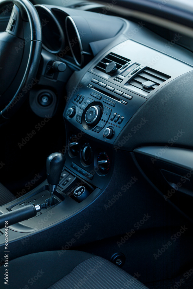 Modern car interior selective focus. Soft colored toned image. Best for wallpapers.