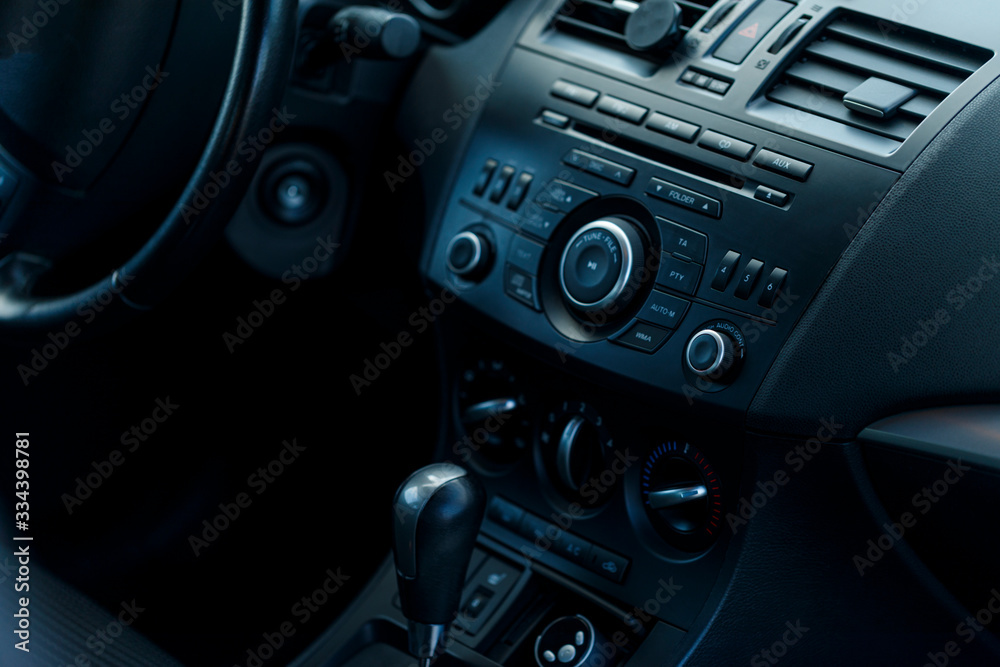 Modern car interior selective focus. Soft colored toned image. Best for wallpapers.