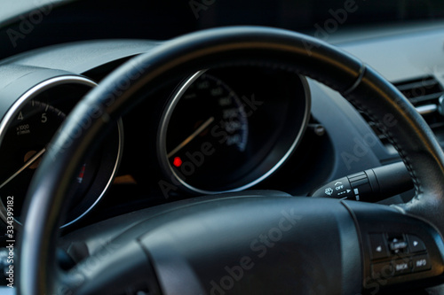 Close up view of the interior of a modern automobile showing the dashboard. © Inception