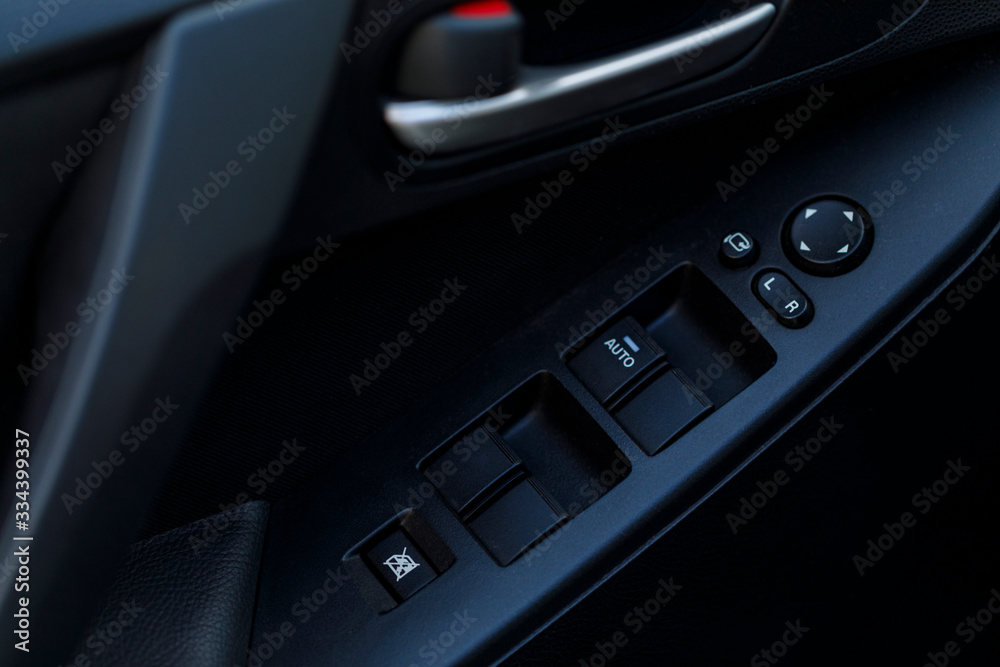 Detail of some black buttons in a car