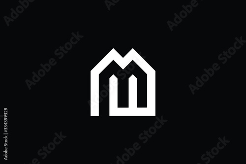 Logo design of M in vector for construction, home, real estate, building, property. Minimal awesome trendy professional logo design template on black background.
