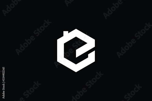 Logo design of E in vector for construction, home, real estate, building, property. Minimal awesome trendy professional logo design template on black background.