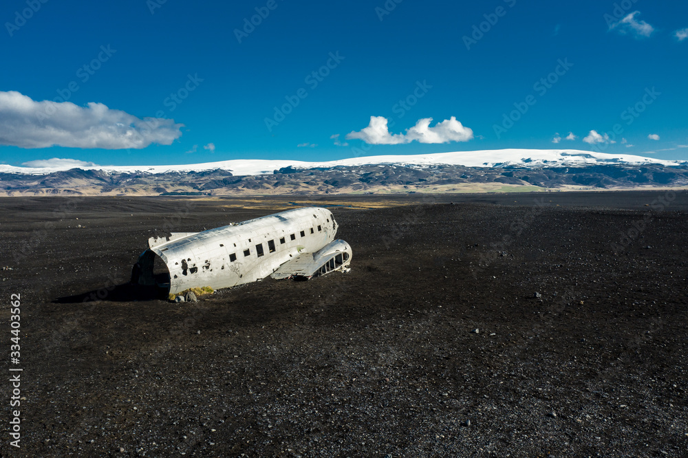 DC3 planewreck on an Icelandic black beach on a sunny day