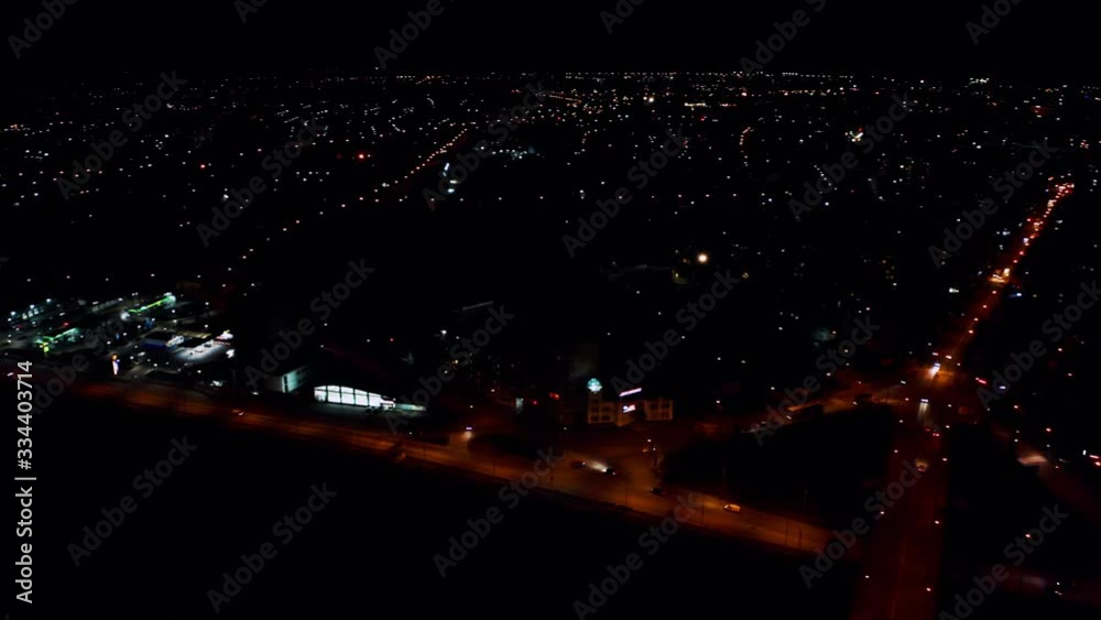 Night city with crossroads filled with traffic in the lights of lanterns 2020 Night city with crossroads filled with traffic in the lights of lanterns 2020