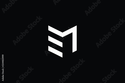 Logo design of M ME EM in vector for construction, home, real estate, building, property. Minimal awesome trendy professional logo design template on black background.