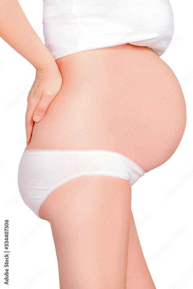 Pregnant caucasian woman with backache pain. Isolated. Pregnant caucasian woman with backache pain. Isolated.