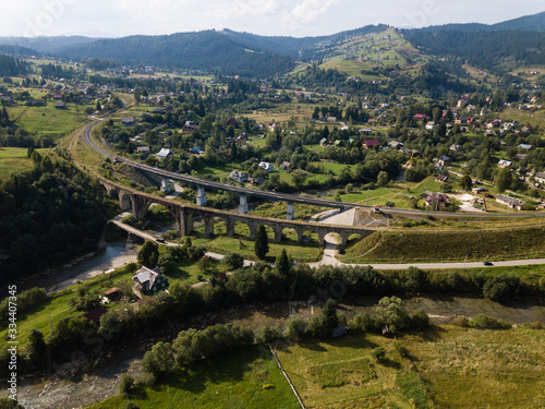 Aerial old viaduct railway crossing in Vorokhta Ukraine Carpathians