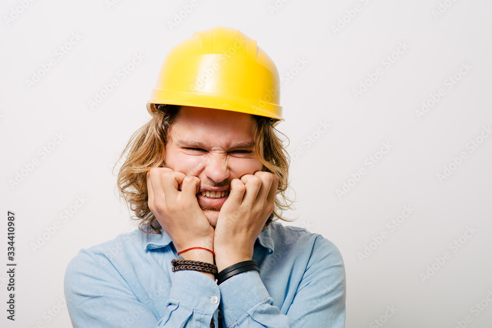 Fearful young worker Fearful young worker