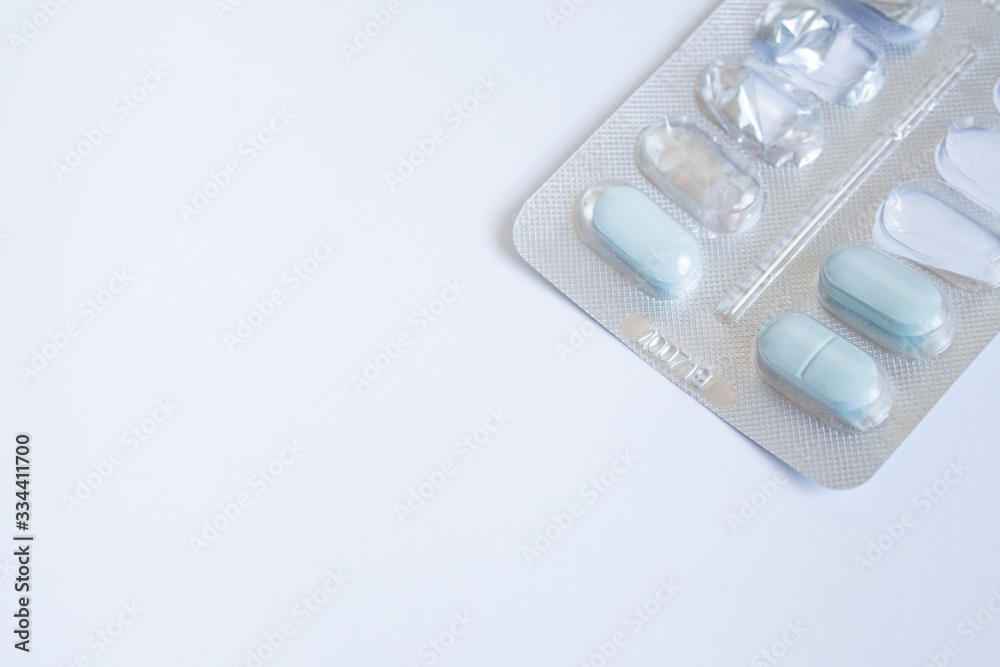 pills for flu, virus and infection. concept of isolation and contactless payments. home treatment of the virus pills for flu, virus and infection. concept of isolation and contactless payments. home treatment of the virus
