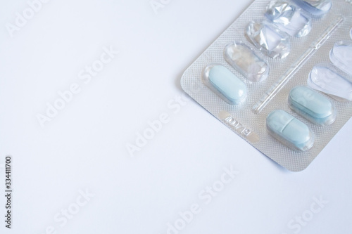 pills for flu, virus and infection. concept of isolation and contactless payments. home treatment of the virus