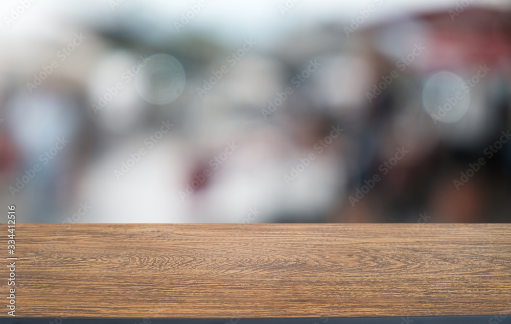 Wood Table Top in Blur Background room interior with empty copy space. Wood Table Top in Blur Background room interior with empty copy space.