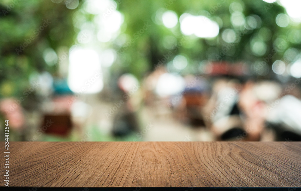 Wood Table Top in Blur Background room interior with empty copy space.