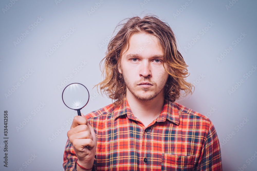 The man with a magnifier The man with a magnifier