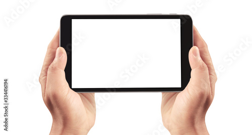 Hands holding tablet touch computer gadget with isolated screen