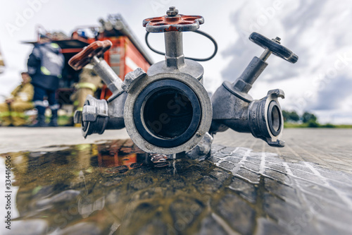 Triple fire hose connection on ground