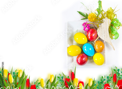 Easter template background with eggs, bird and tulip flowers on white background. Free space for your desidn photo