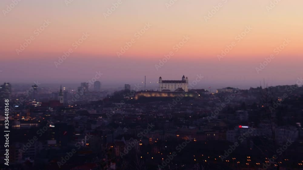 Bratislava castle zoom out shot during the colorful sunset, Slovakia Bratislava castle zoom out shot during the colorful sunset, Slovakia