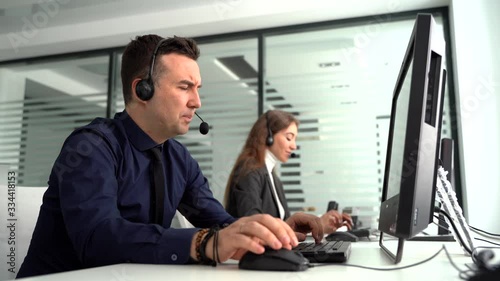 Male customer service agent in a call center