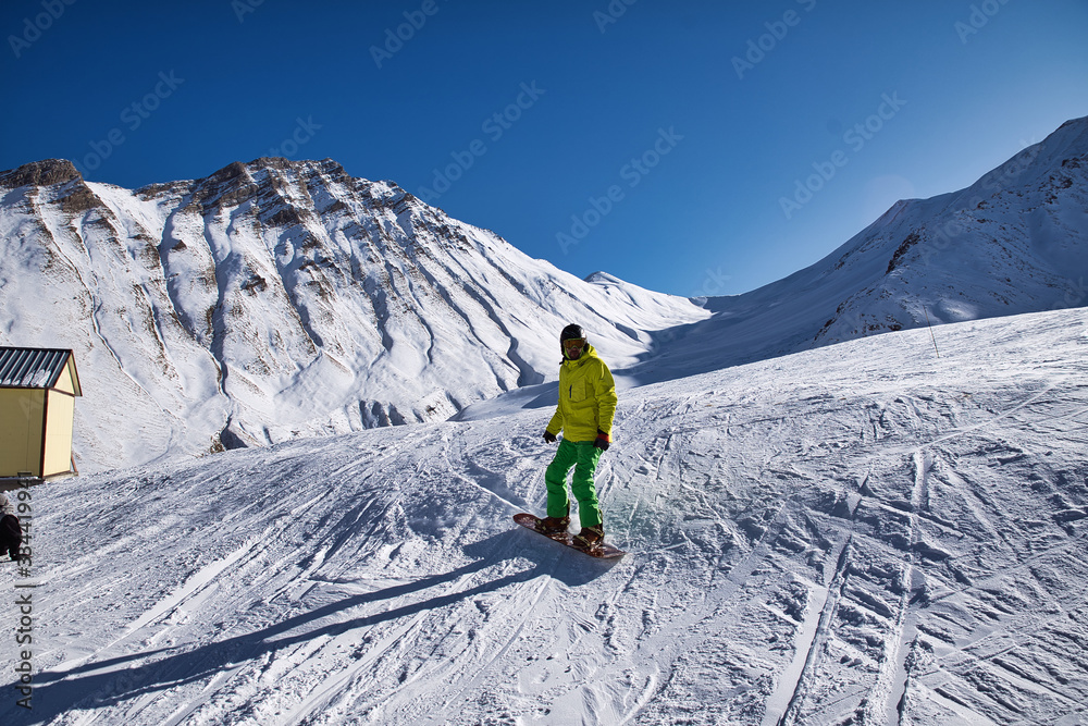 snowboarder descends from the mountain