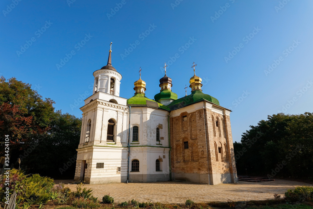The view on orthodox christian church. Beautifull summer landscape with church. Religion orthodox church, spring day.